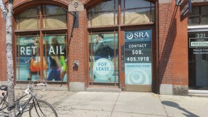 "for rent" signage and window graphics by Seamless Wraps